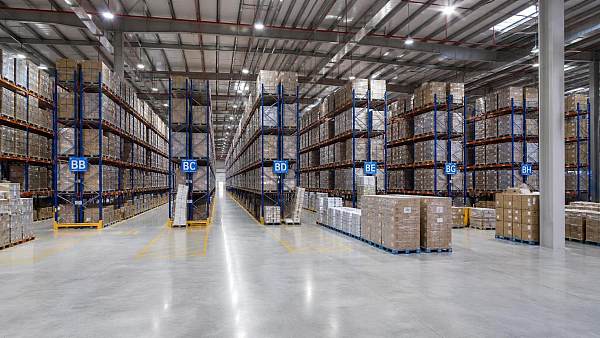 What determines warehouse stacking systems price for a new warehouse?