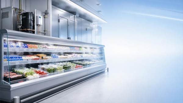 Thermodynamic Energy Squeezing in Refrigeration: What Gains Are Real?