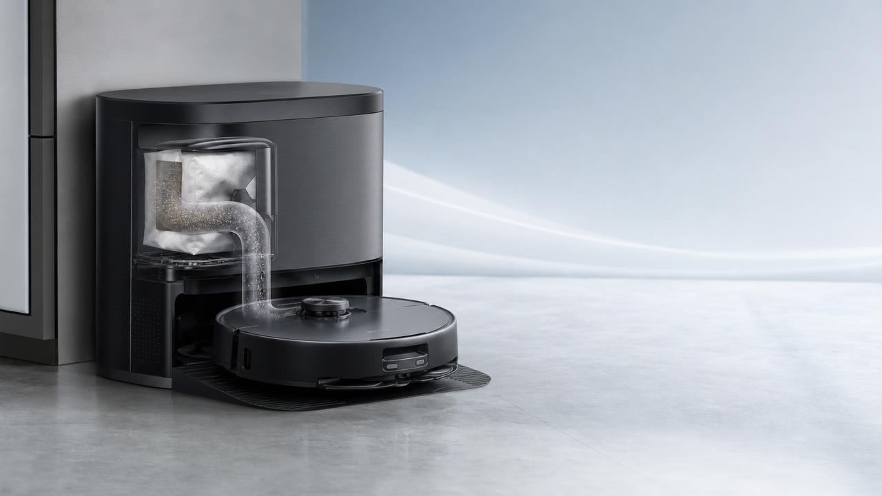 Auto-emptying Base Stations in Consumer Robotics: When Are They Worth the Extra Cost?