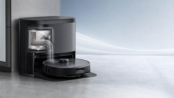 Auto-emptying Base Stations in Consumer Robotics: When Are They Worth the Extra Cost?