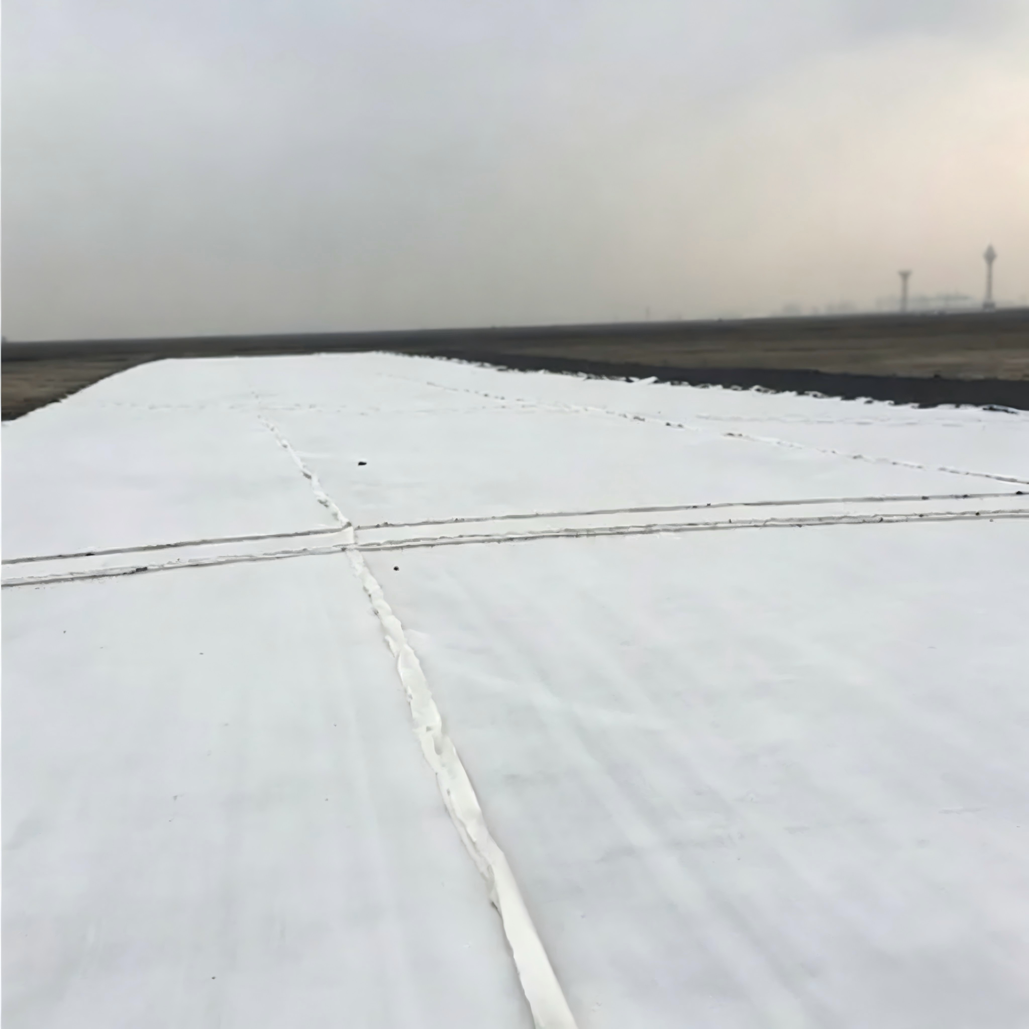 Géotextile non tissé aiguilleté en fibre longue continue 100% Polyester pour la filtration du sable, le renforcement des chaussées