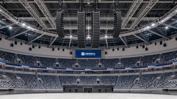 Stadium Sound Reinforcement Coverage Optimization: Key Design Trade-Offs