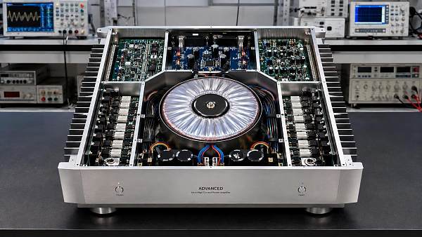 How does audio magnetic field design reduce hum and EMI?