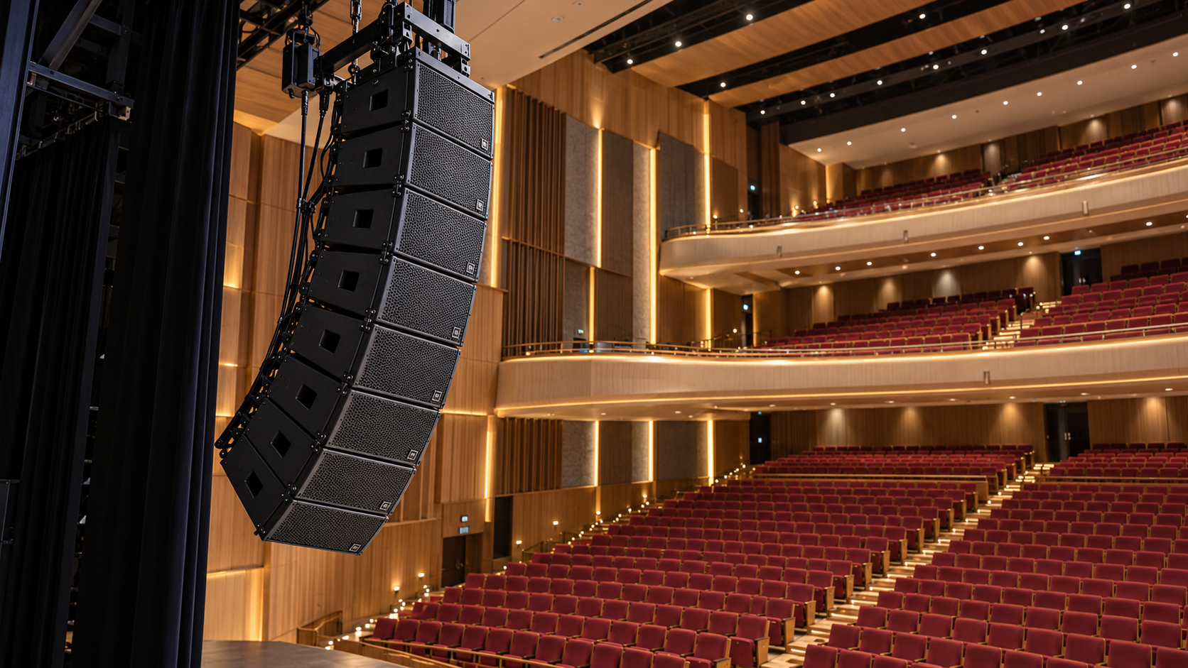 How line array aiming affects live sound coverage for theaters
