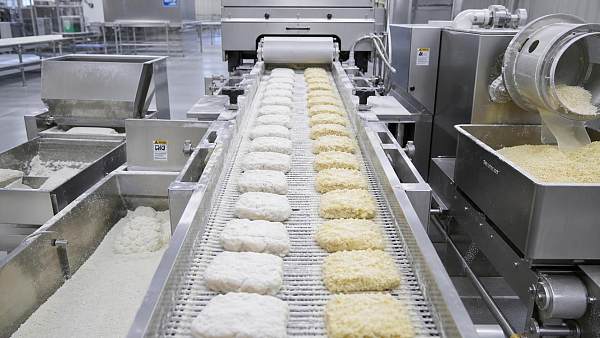 How can coating pickup control reduce rework on breaded products?