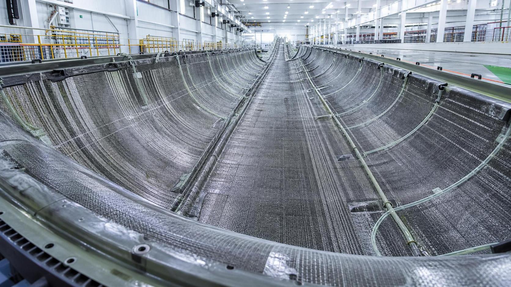 Warp Knitted Composite Fabric in Wind Blades: Performance Gains and Process Trade-Offs