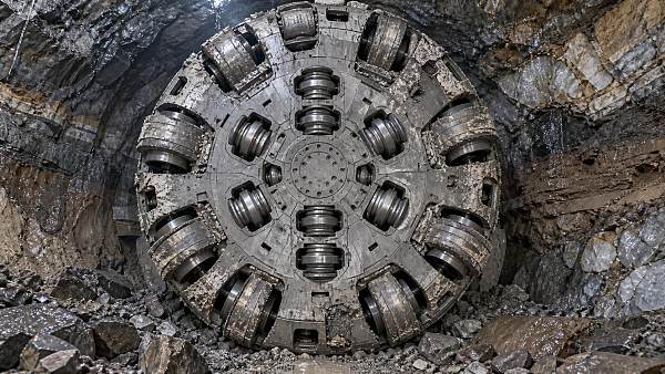 What causes excessive disc cutter wear in variable-ground TBM tunneling?