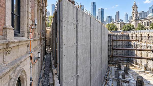 Is diaphragm wall construction safe for deep basements adjacent to existing structures?