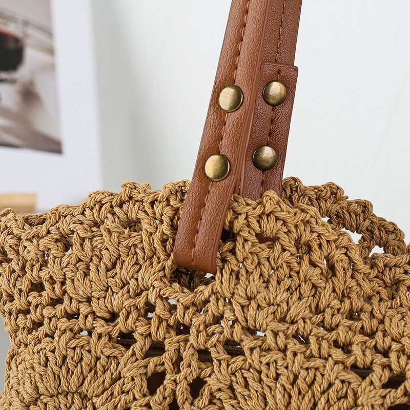 Openwork flower shoulder bag