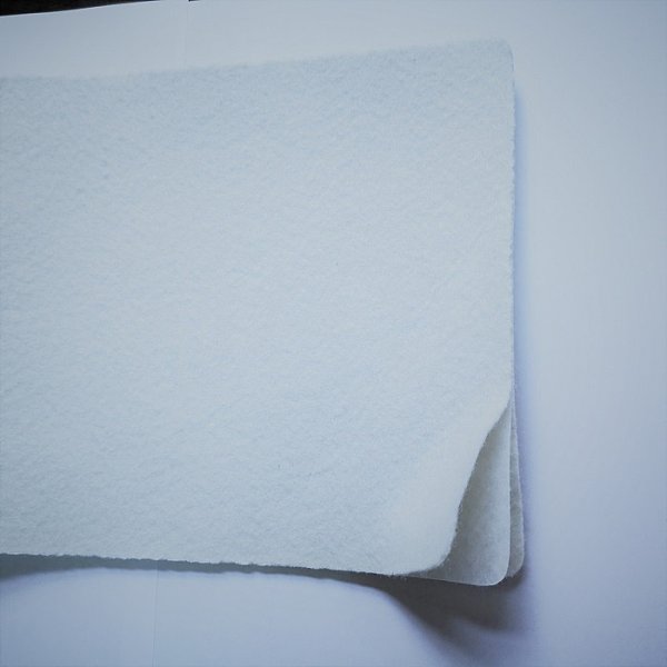 One membrane two geotextiles