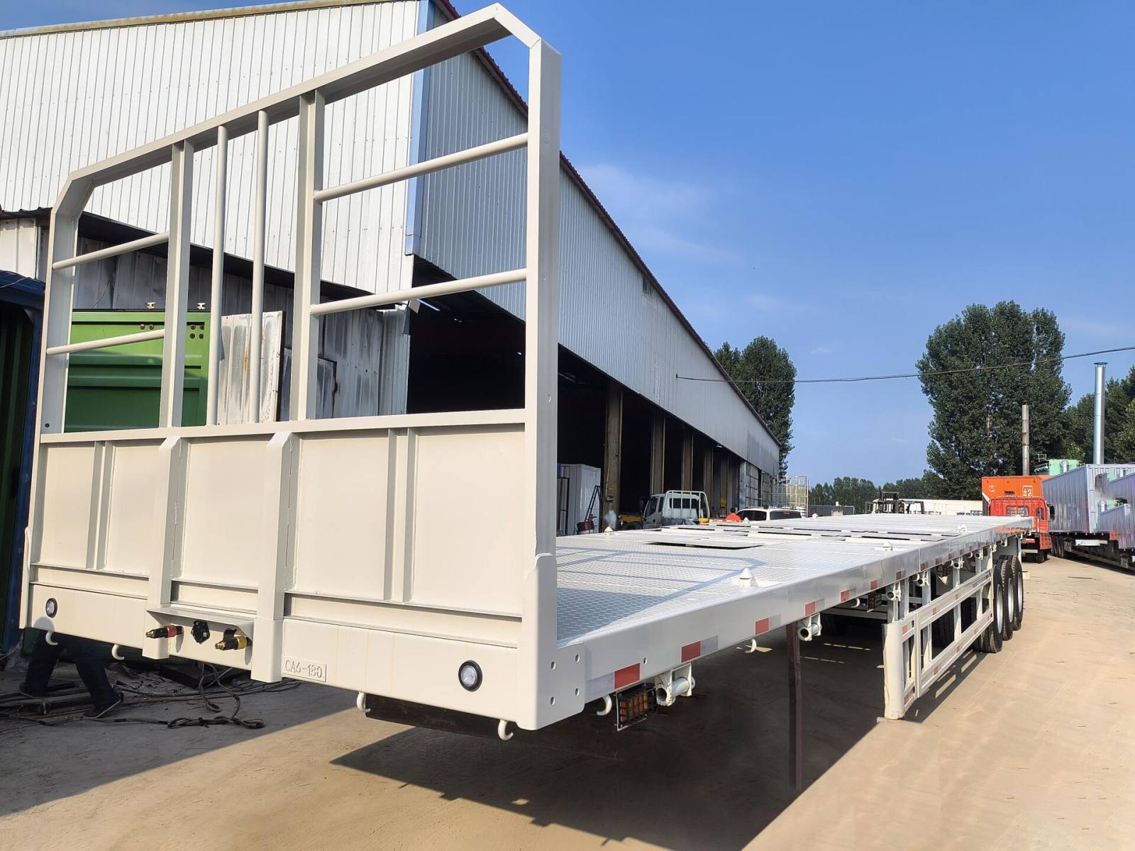Semirremolque de plataforma plana extensible de 3 ejes