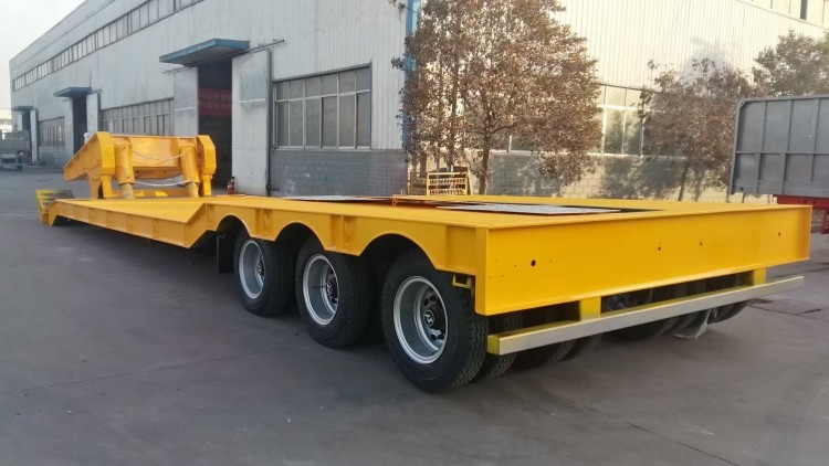 1788240040953281580910018560.jpg semirremolque de cama baja de 3 ejes