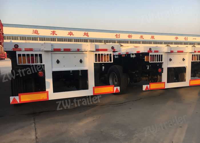 2044-202006031836034975 three axle flatbed trailer