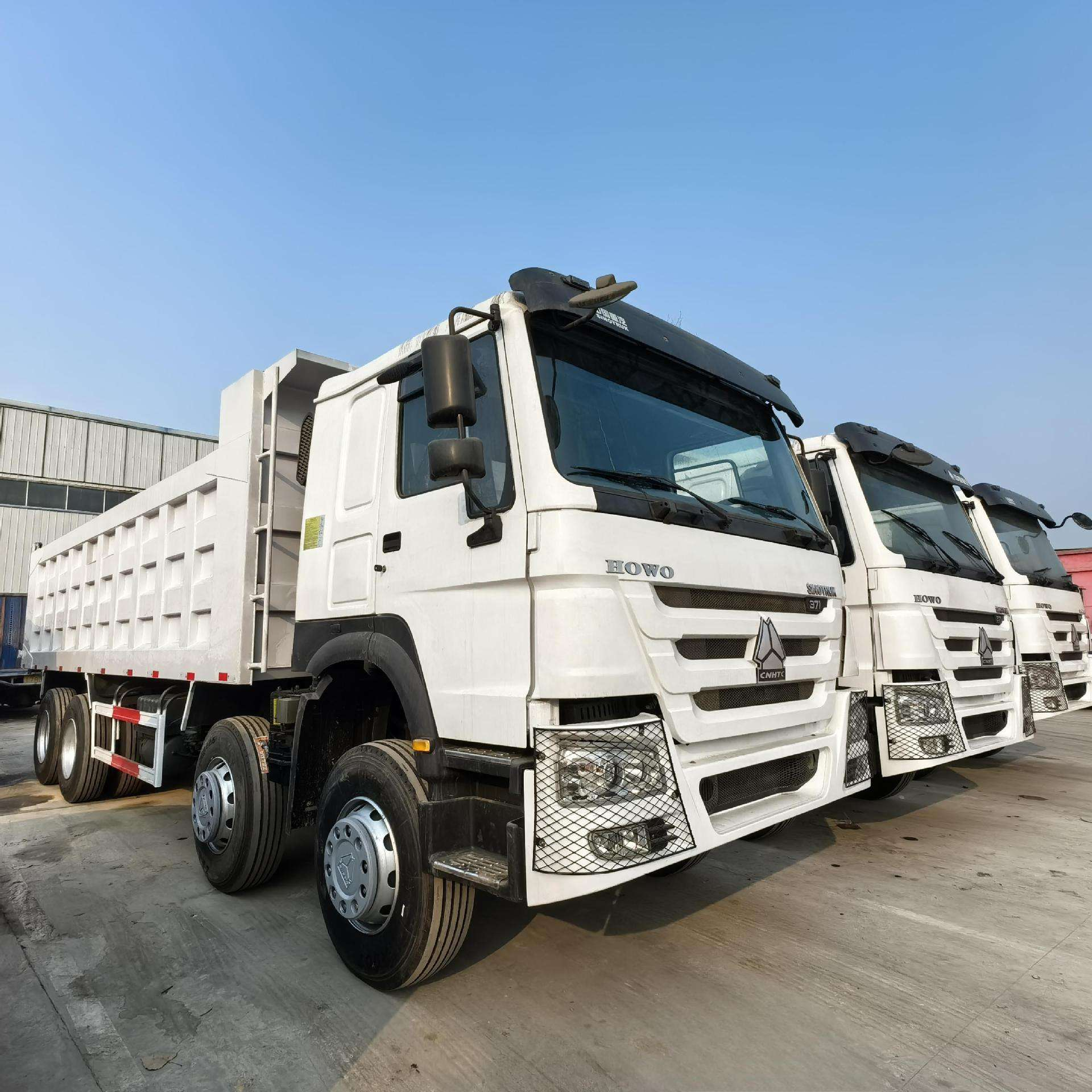 Camion-benne lourd Sinotruk Howo TX 440HP 8x4 à benne en U de 6,5 m