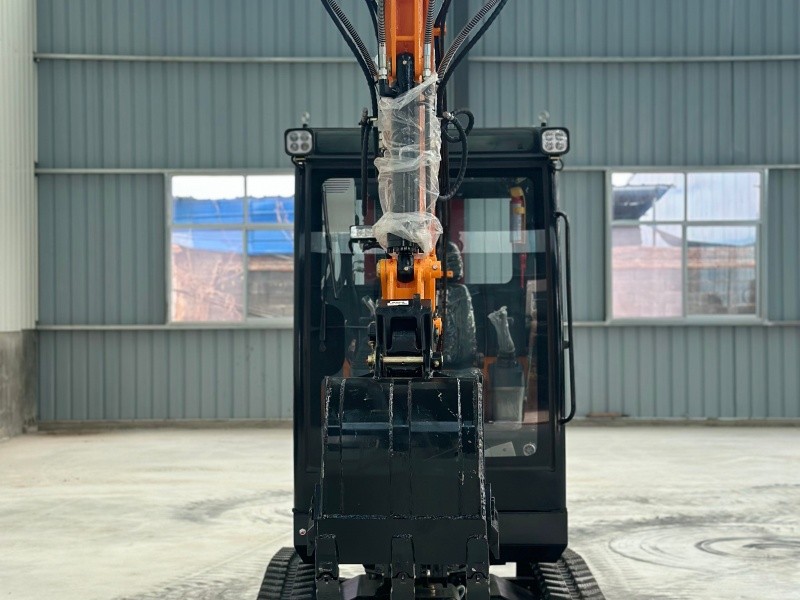 Rear view of a 2-ton orange mini excavator with a cab. SL20 Mini Excavator