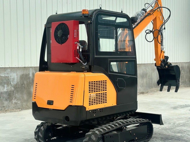 Side view of a 2-ton orange mini excavator with a cab.-3 SL20 Mini Excavator