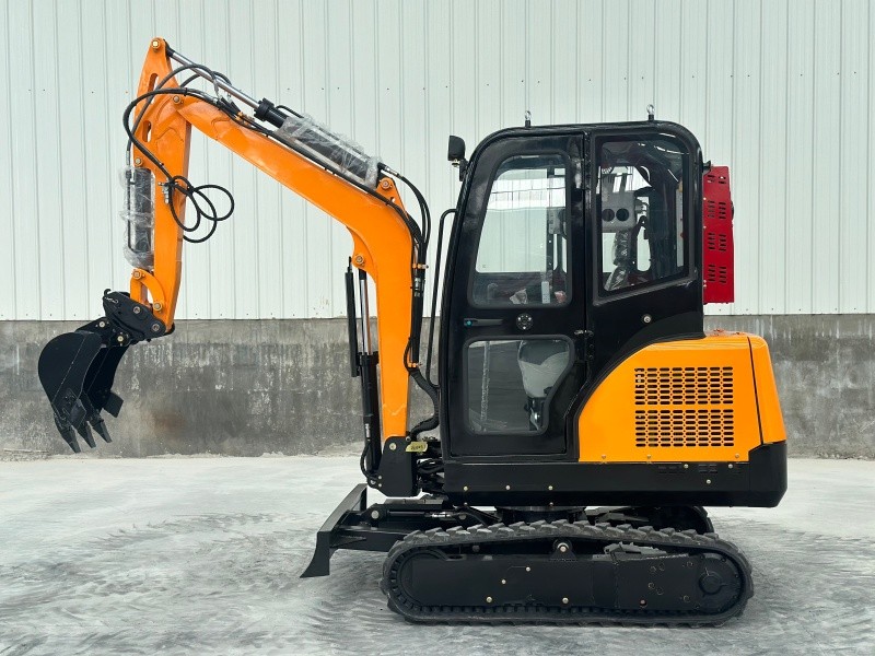 Side view of a 2-ton orange mini excavator with a cab. SL20 Mini Excavator