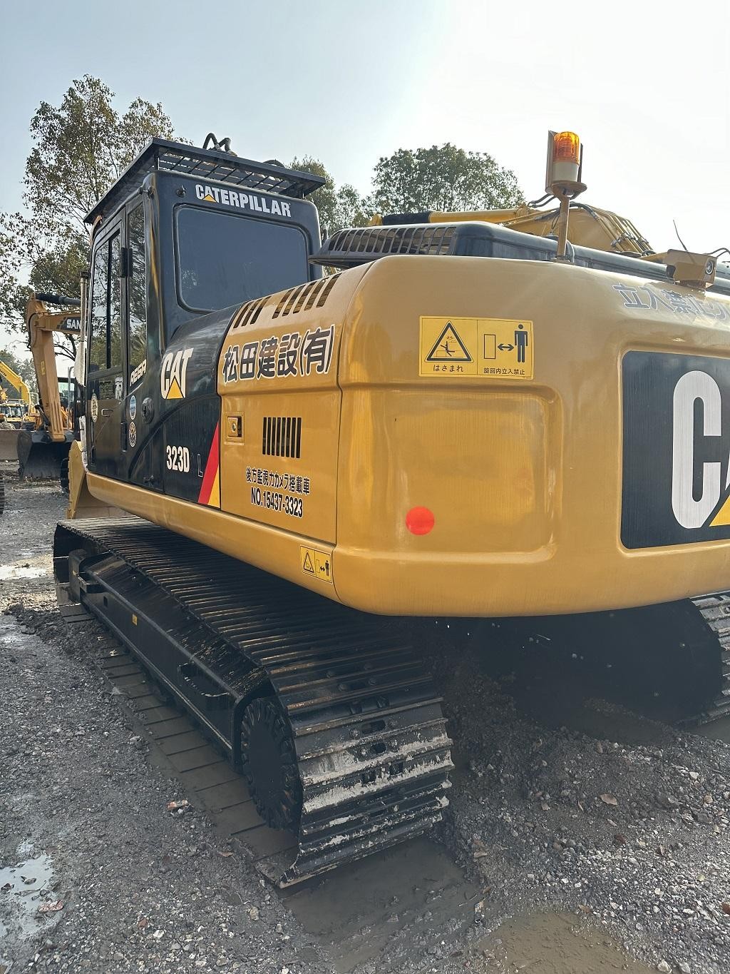Экскаватор Cat 323