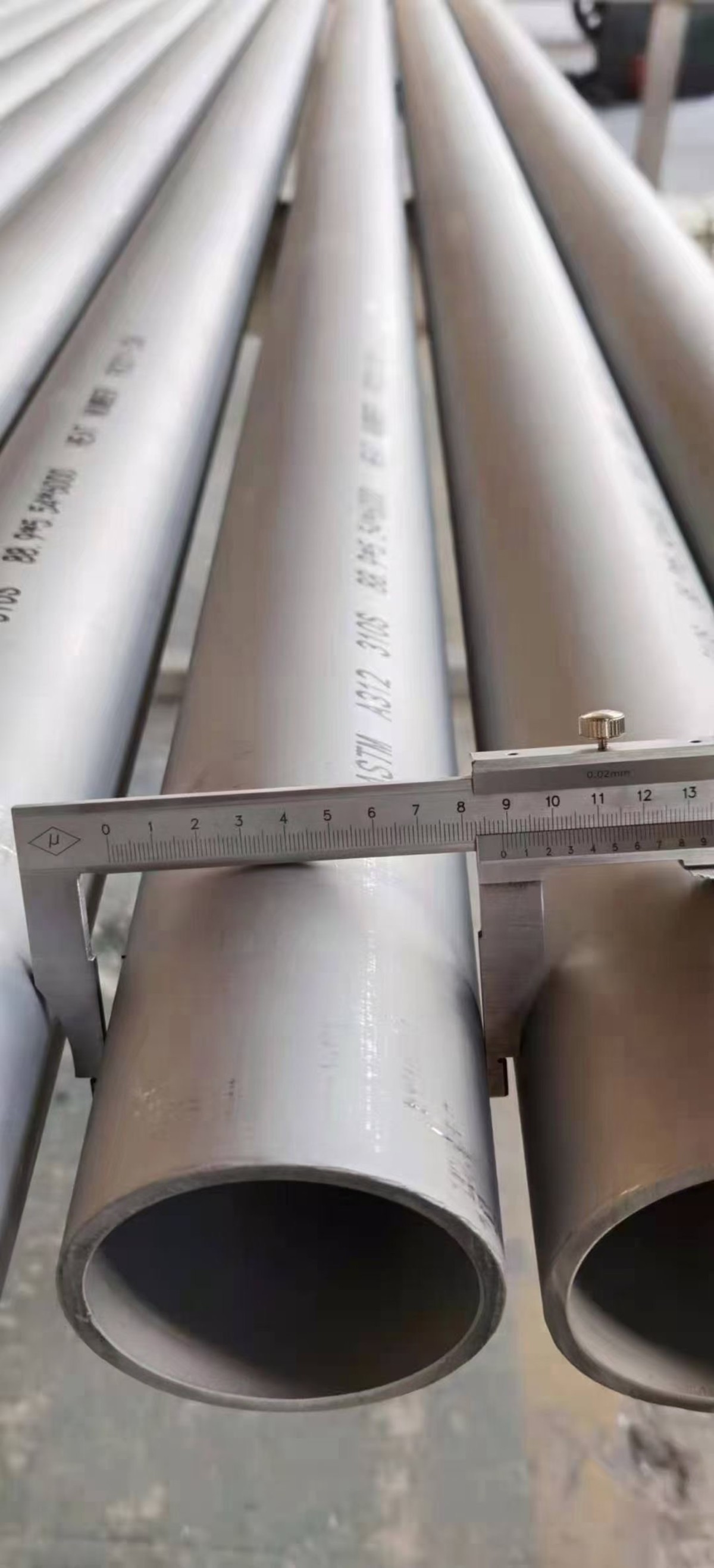 "Inspection for 310S pipes with caps protect ion.  Standard test before delivery. (we will test as your request.) Professional services and reliable goods to receive customers' return order."