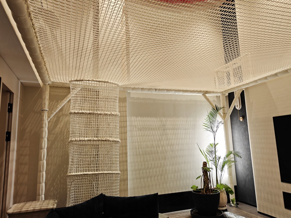 indoor-net-lounge-access Custom Villa Design | Relax and Pet Your Cat on a Rope Net Installed in Your Home
