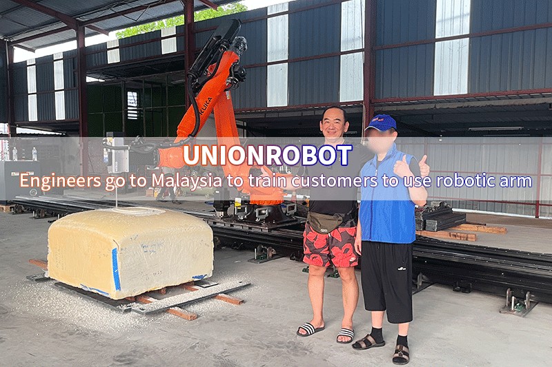 Engineer went to Malaysia to train customers to use robotic arm