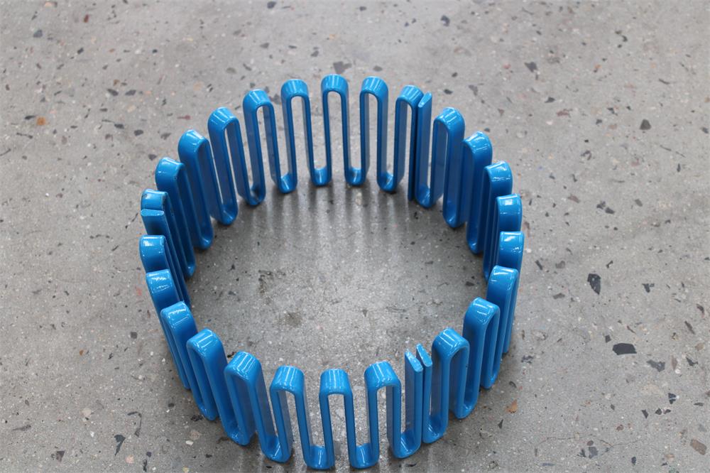 Structural advantages of serpentine spring coupling