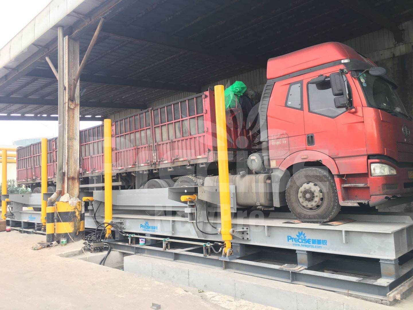 Side-turning hydraulic truck dumper Side-turning hydraulic truck dumper
