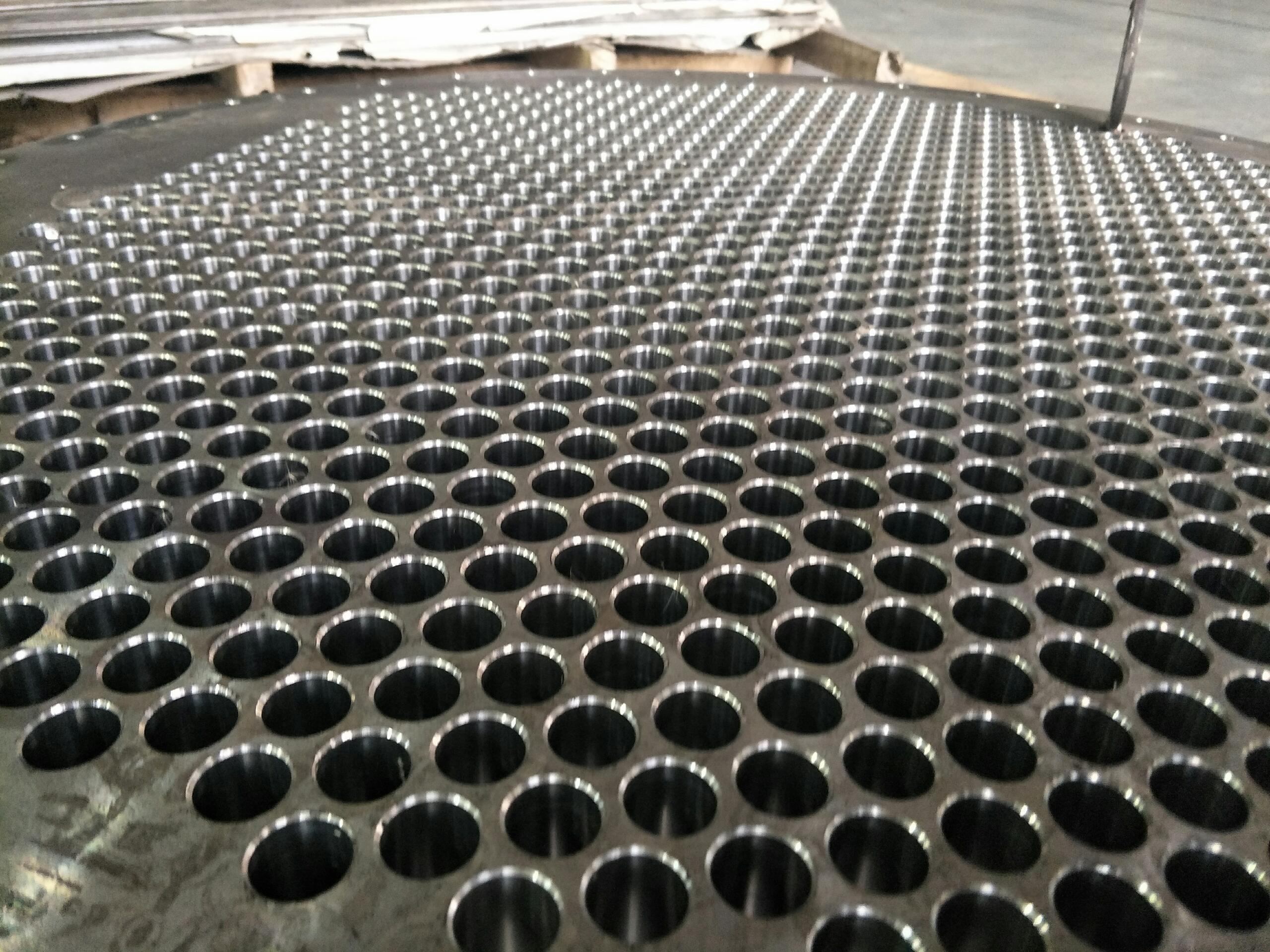 How does the CNC Tubesheet Drilling Machine Deal With High Hardness Materials?