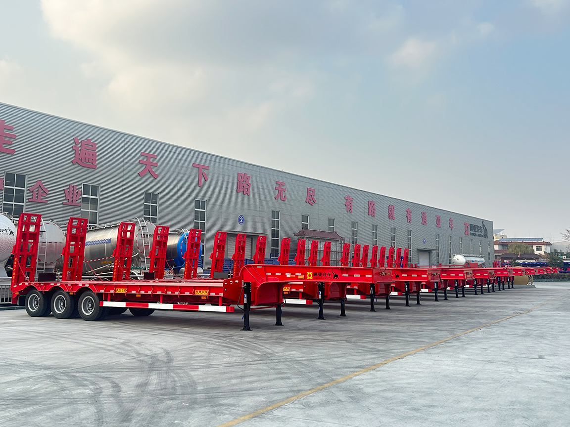 A large number of Low Bed Semi-trailers ready to be shipped to overseas