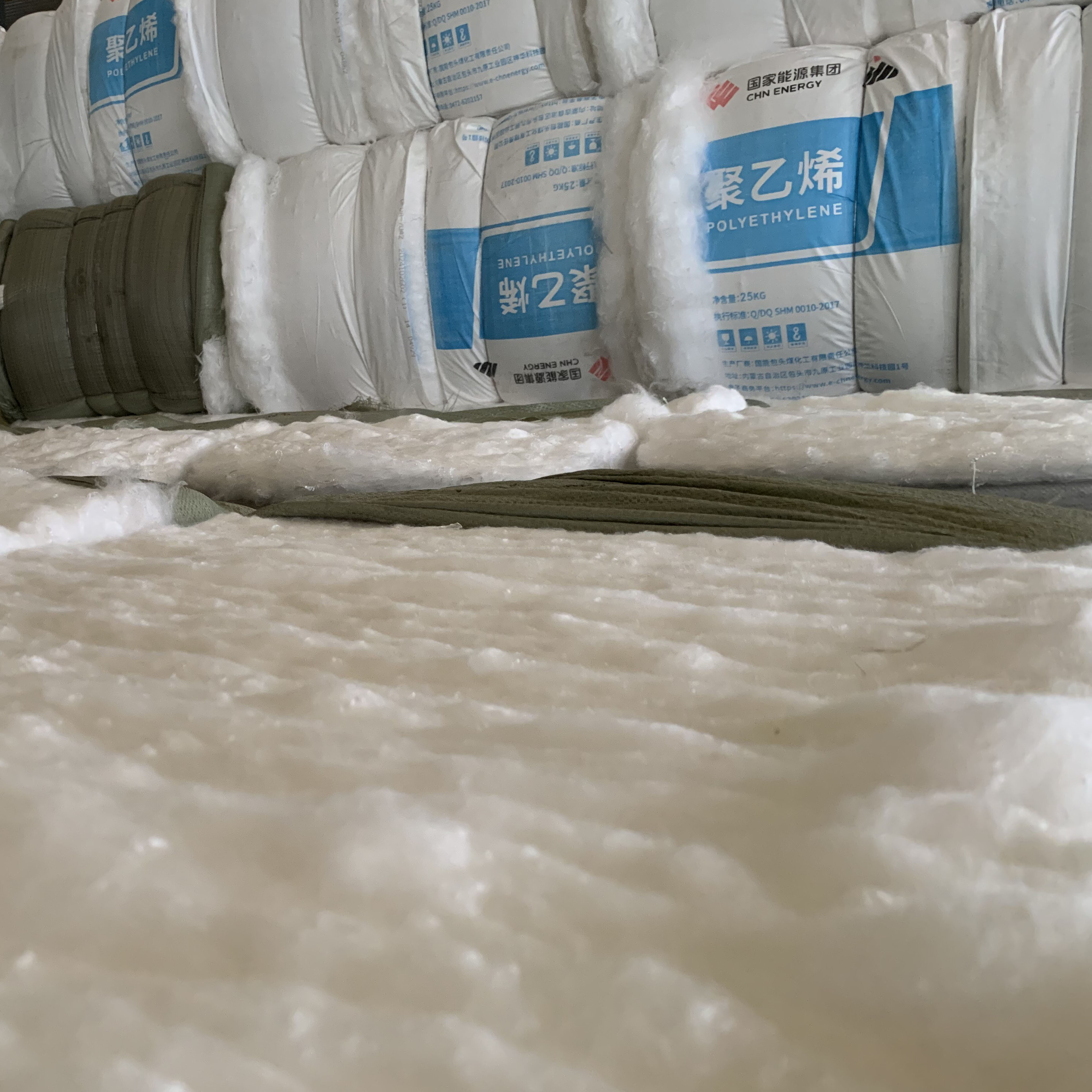 Short fiber needle-punched reinforced nonwoven geotextile