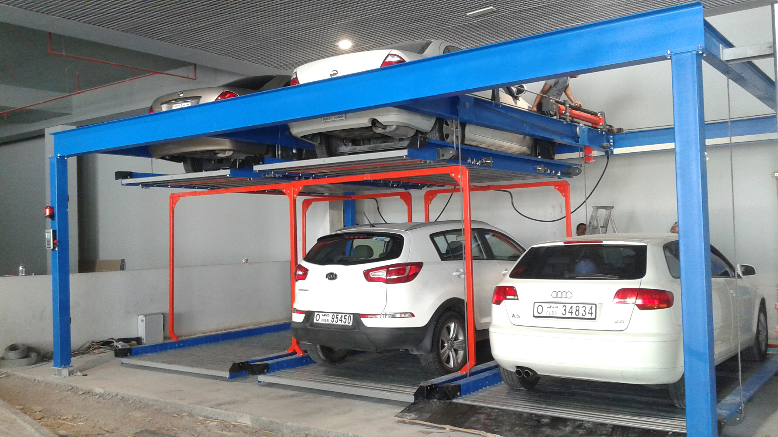The United Arab Emirates - 2 level puzzle parking system - 5 car spaces