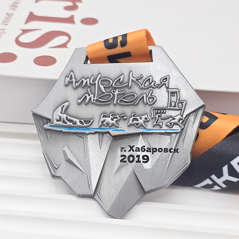 Frosted silver metal medal, commemorative event item, orange and silver color blocking, 3D relief sports collectible.
