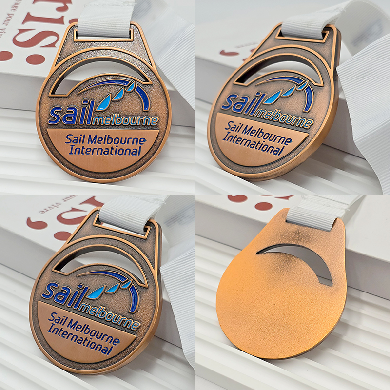 Vintage bronze metal medal, commemorative blue painted sailboat element for the Melbourne International Yacht Race, a collectible nautical event.