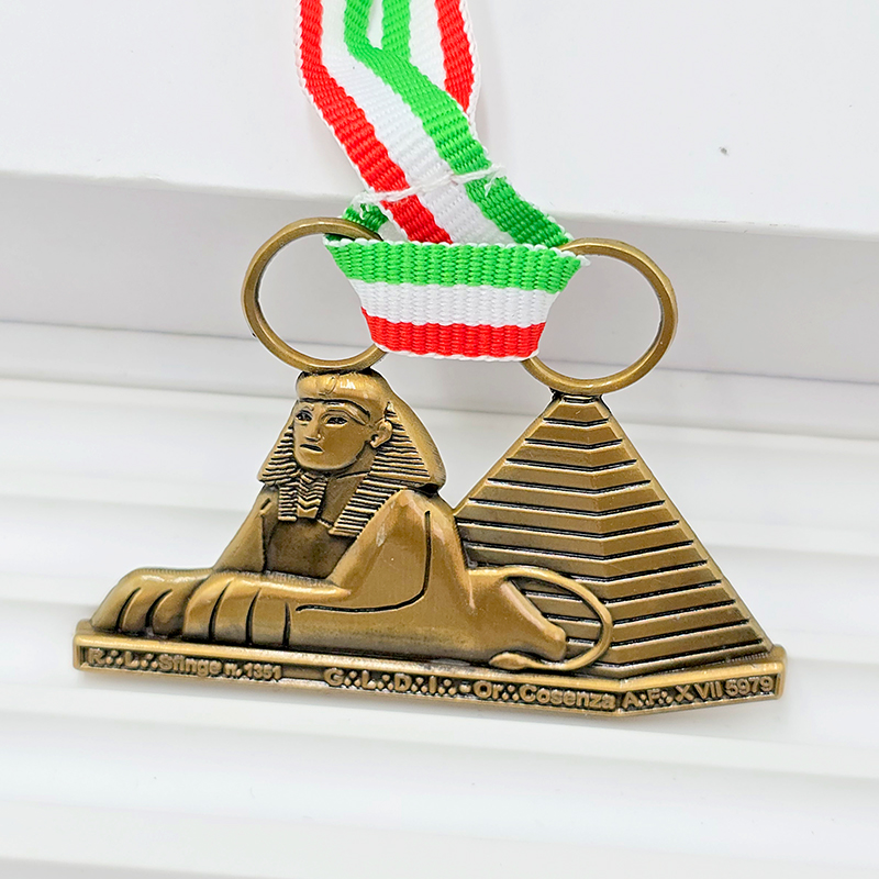 Vintage bronze metal medal, Egyptian Sphinx pyramid 3D design, commemorative collectible for sporting events.