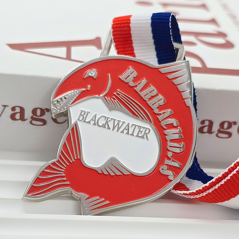 Silver and red color-blocked metal medal, commemorative fish-shaped openwork three-dimensional relief water sports collectible.