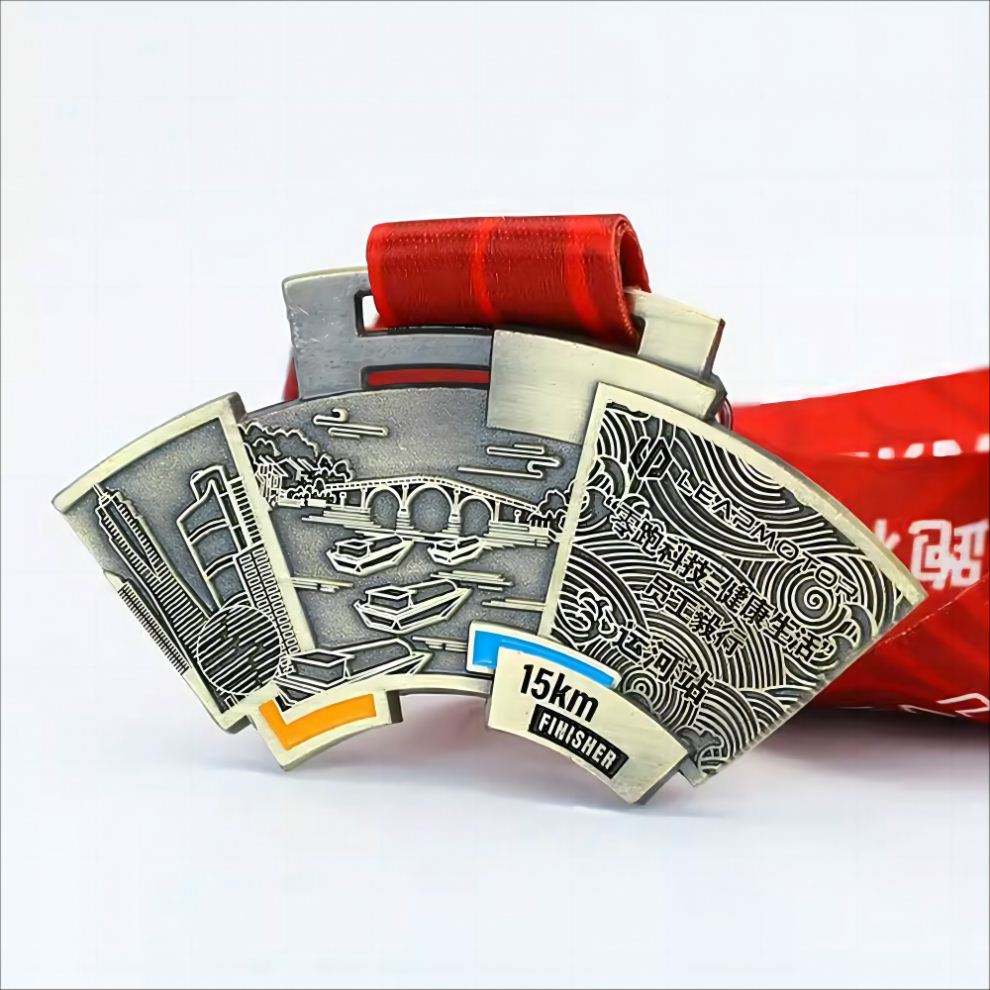 Gold, silver, and bronze medals for martial arts competitions; three-dimensional relief medals with openwork ring patterns.
