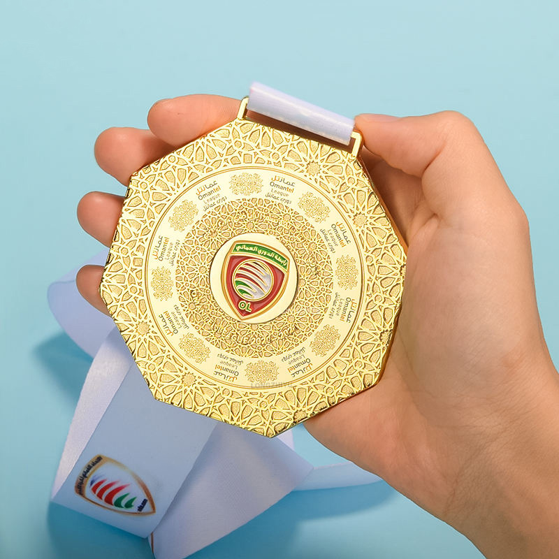 A collection of swimming medals: Gold, Silver, and Bronze shield-shaped / hexagonal / circular relief swimming commemorative badges.