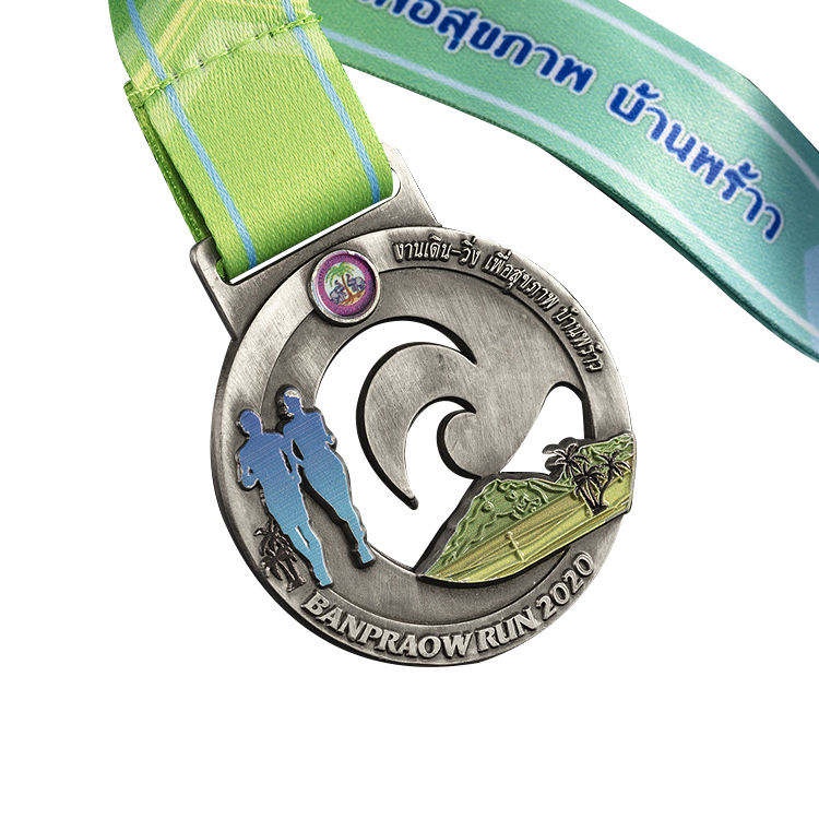 Club race medals; bronze castle landscape relief finisher medals.