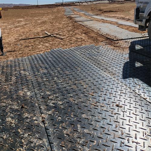 Heavy Machinery Access Solutions: Polyethylene Temporary Road Mats for Construction Sites