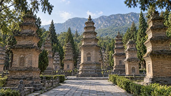 Should you set aside one day or two to visit Shaolin Temple and the Longmen Grottoes?