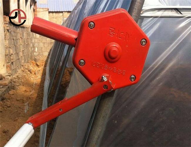 Manual film roller