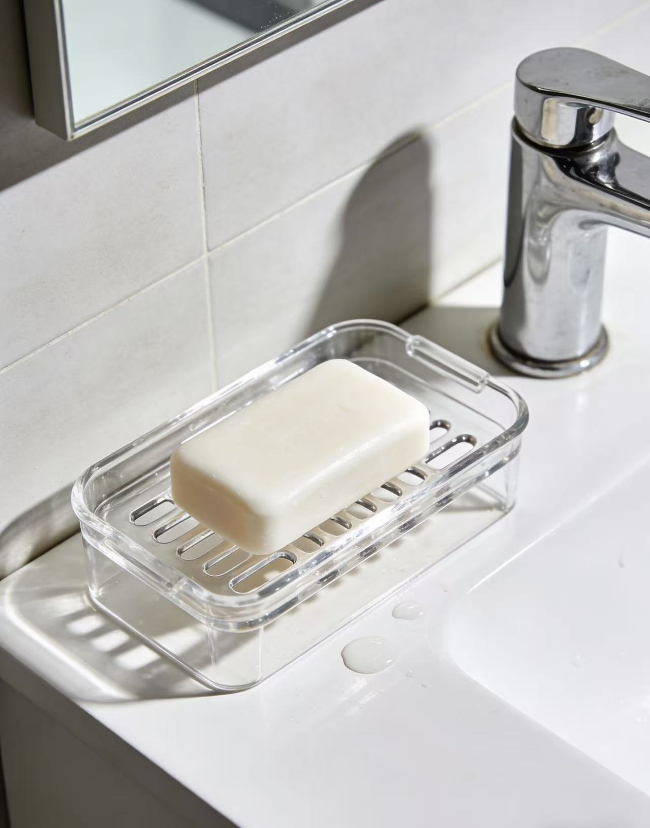 Acrylic soap dish, drains soap without clogging