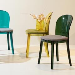 The transparent acrylic chair redefines the sophisticated ambiance of home decor