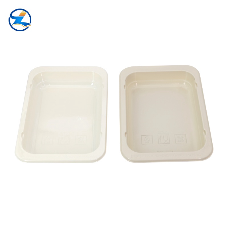 yellow PLA tray, black and white CPET tray, grey PP tray