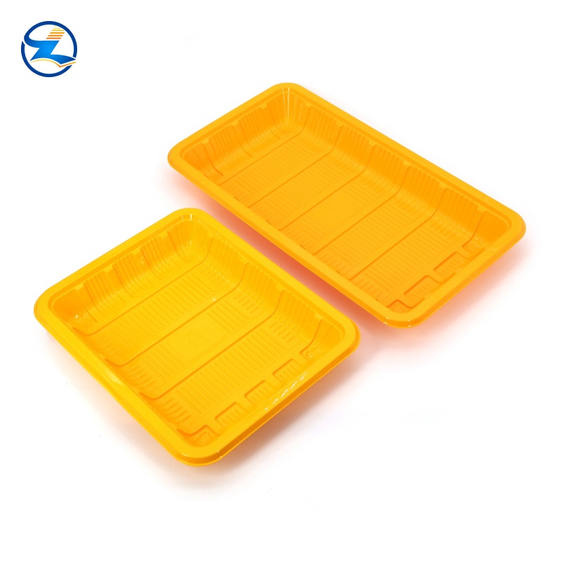 yellow PLA tray, black and white CPET tray, grey PP tray