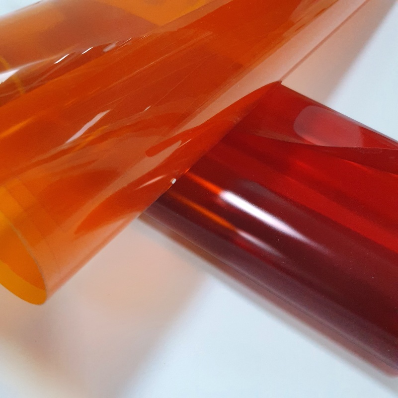 Light-proof, opaque orange and wine-red rigid PVC pharmaceutical film