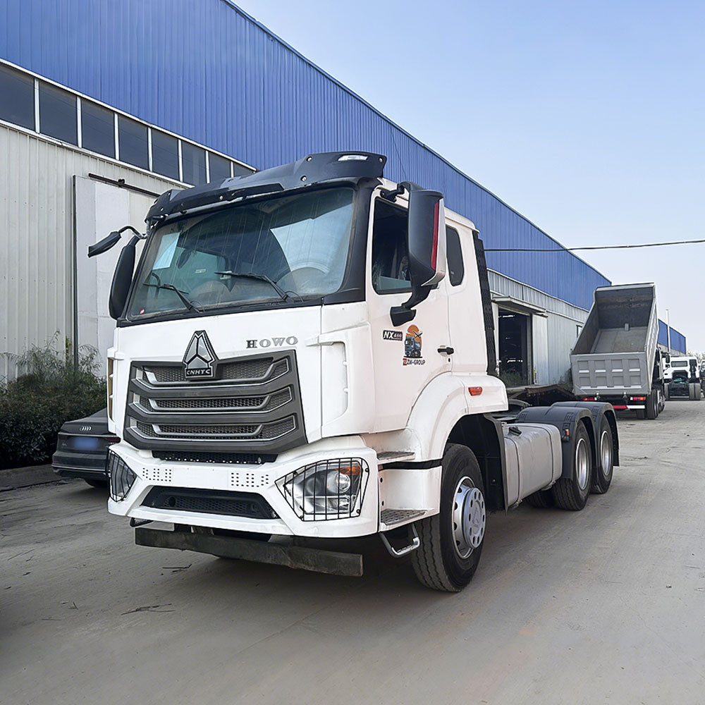 HOWO NX 6x4 400HP tractor truck front three-quarter view highlighting cabin and front axle