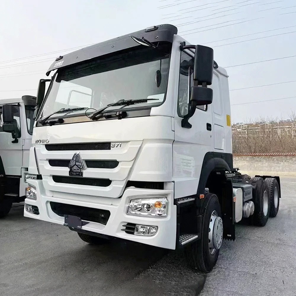 HOWO 371HP 6x4 Tractor Truck front 3/4 view highlighting cab design and reinforced chassis