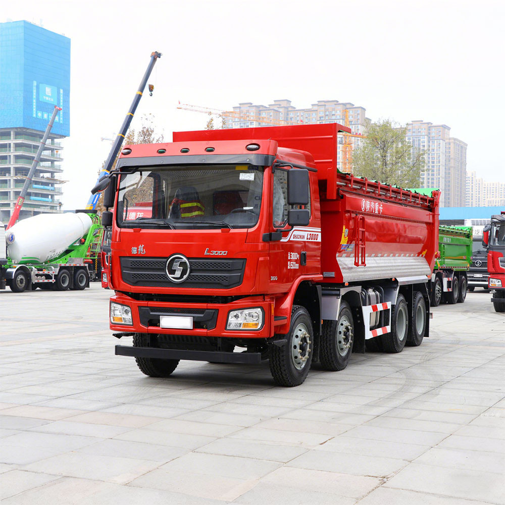 Shacman L3000 8x4 350HP dump truck front three quarter view highlighting dump body and cab