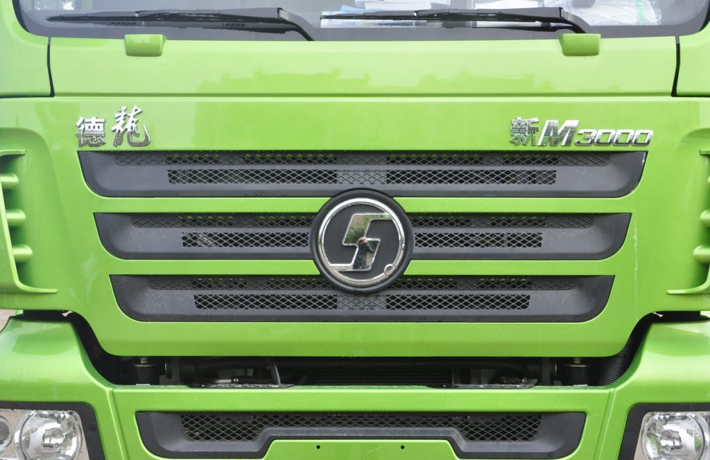 Shacman M3000 6x4 350HP dump truck front view showing heavy duty cab and chassis Shacman M3000 6x4 350HP dump truck front view showing heavy duty cab and chassis